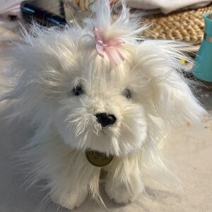 Fluffy White Plush Dog with Pink Bow